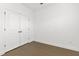 An empty bedroom with hardwood floors and a closet at 3785 Allegretto Cir # 230, Atlanta, GA 30339