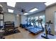 Bright fitness center equipped with modern treadmills, elliptical machines, stationary bike, and free weights at 3785 Allegretto Cir # 230, Atlanta, GA 30339