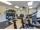 Well-equipped gym offers a variety of fitness machines, free weights, and a full-length mirror for a complete workout experience at 3785 Allegretto Cir # 230, Atlanta, GA 30339