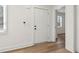 Bright home entryway features new flooring, modern paint, and lots of natural light at 657 Woods Nw Dr, Atlanta, GA 30318