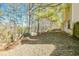 Backyard view that showcases the yard space, privacy fence and surrounding trees at 2695 Virginia Cv, South Fulton, GA 30296