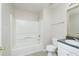 Cozy bathroom with a shower and tub combination, toilet, and vanity with sink at 2695 Virginia Cv, South Fulton, GA 30296