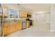 Kitchen featuring stainless steel appliances, countertops, and an adjacent dining area at 2695 Virginia Cv, South Fulton, GA 30296