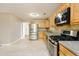 Modern kitchen with stainless steel appliances and light-colored countertops at 2695 Virginia Cv, South Fulton, GA 30296