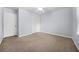 Bedroom featuring neutral carpet, ceiling fan, and a closet at 1751 Twin Brooks Se Dr, Marietta, GA 30067