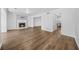 Spacious living room featuring a fireplace, modern flooring, and neutral color palette at 1751 Twin Brooks Se Dr, Marietta, GA 30067