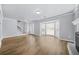 Inviting living room with hardwood floors, bay window, and stairs visible at 1751 Twin Brooks Se Dr, Marietta, GA 30067