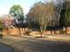 Well-maintained landscaping and brickwork at the community entrance at 3083 Colonial Way # N, Atlanta, GA 30341