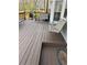 View of the deck with a chair, table, and grill; great for entertaining outdoors at 3738 Windy Hill Se Dr, Conyers, GA 30013