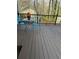 An outdoor deck perfect for relaxing with a table and chairs for enjoying the views at 3738 Windy Hill Se Dr, Conyers, GA 30013