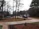 Street view from the driveway of a home in a quiet, established neighborhood at 3738 Windy Hill Se Dr, Conyers, GA 30013