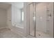 This bathroom has a glass door shower and a separate tub at 455 Charleston Pl, Villa Rica, GA 30180