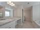 A bathroom featuring a vanity with granite counters, modern cabinets, and a mirror at 455 Charleston Pl, Villa Rica, GA 30180