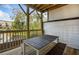 An outdoor deck features a dining table and chairs with views of the community at 1119 Rivard Nw Cir, Atlanta, GA 30318