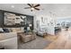 Open-concept living room with a large island and barstools adjacent to a gourmet kitchen at 1119 Rivard Nw Cir, Atlanta, GA 30318