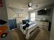 View of bedroom with ceiling fan, TV, striped bedding and construction truck decorations at 139 Concord Place, Hiram, GA 30141