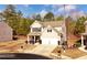 Two-story house on corner lot with a two-car garage and manicured landscaping at 139 Concord Pl, Hiram, GA 30141