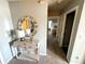 Hallway with table, mirror, and lamp at 139 Concord Place, Hiram, GA 30141