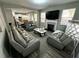 Living room featuring fireplace, large windows, and hardwood floors at 139 Concord Place, Hiram, GA 30141