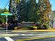 Sign for Harmony Creek neighborhood amidst lush landscaping at the community entrance at 139 Concord Pl, Hiram, GA 30141
