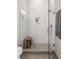 Modern bathroom with white subway tile, a glass-enclosed shower, and sleek fixtures at 22 Airline Ne St # 403, Atlanta, GA 30312