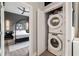 Stylish bedroom with gray walls, a modern bed frame, and a convenient laundry closet at 22 Airline Ne St # 403, Atlanta, GA 30312