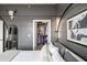 Modern bedroom with gray walls and decor, plus a walk-in closet for ample storage at 22 Airline Ne St # 403, Atlanta, GA 30312