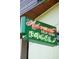 Neon sign for 'Automat Self-Serv Bagels' with retro design elements at 22 Airline Ne St # 403, Atlanta, GA 30312