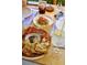 Delicious charcuterie board with cured meats, artisanal cheeses, and fresh garnishes on a wooden table at 22 Airline Ne St # 403, Atlanta, GA 30312