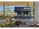 Outdoor view of Brash coffee shop with ample seating, plants and covered community space at 22 Airline Ne St # 403, Atlanta, GA 30312
