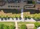 Top-down view showcases a meticulously landscaped community space with walkways, benches, and lush greenery at 22 Airline Ne St # 403, Atlanta, GA 30312