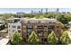 Modern brick apartment building with balconies and rooftop deck offers stunning city views at 22 Airline Ne St # 403, Atlanta, GA 30312