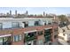 Attractive brick apartment building with balconies, patios, and a skyline view at 22 Airline Ne St # 403, Atlanta, GA 30312