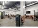 Well-equipped fitness center with modern weight machines, cardio equipment, and mirrors at 22 Airline Ne St # 403, Atlanta, GA 30312