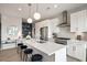 Bright and modern kitchen with stainless steel appliances and large island at 22 Airline Ne St # 403, Atlanta, GA 30312