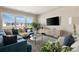 Comfortable living room with a large sectional sofa, stylish furniture, and a TV for entertainment at 22 Airline Ne St # 403, Atlanta, GA 30312