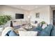 Cozy living room area features plush seating, a modern entertainment center, and stylish decor at 22 Airline Ne St # 403, Atlanta, GA 30312