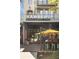 Hawkers Asian Street Food featuring outdoor seating, large signage, and a vibrant storefront at 22 Airline Ne St # 403, Atlanta, GA 30312