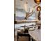 Unique restaurant interior with decorative tree branch and modern lighting fixtures at 22 Airline Ne St # 403, Atlanta, GA 30312
