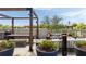 Inviting rooftop deck with modern seating, outdoor dining, planters, and a skyline view at 22 Airline Ne St # 403, Atlanta, GA 30312