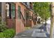 Charming brick townhomes feature private entrances and black iron railings in a walkable neighborhood at 22 Airline Ne St # 403, Atlanta, GA 30312