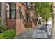 Charming brick townhomes with small porches, black railing and lovely street views at 22 Airline Ne St # 403, Atlanta, GA 30312