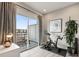 Inviting balcony with a seating area and sliding glass doors leading indoors to gym at 22 Airline Ne St # 403, Atlanta, GA 30312