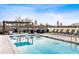 Rooftop pool with lounge chairs and a stunning skyline view at 22 Airline Street Ne # 403, Atlanta, GA 30312