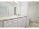 Bright bathroom featuring white cabinetry, quartz countertops, and modern fixtures at 23310 Plantation Dr, Atlanta, GA 30324