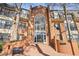 Brick building exterior with a grand entrance, staircase, and decorative windows at 23310 Plantation Dr, Atlanta, GA 30324