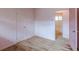 An empty bedroom shows an interior doorway leading into an adjacent bathroom at 301 Lady Agatha Ct, Jonesboro, GA 30236