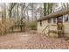 Backyard view of the house with a covered carport at 3483 Napoleon St, Atlanta, GA 30337