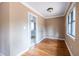 Inviting dining room with hardwood floors, natural light, and views into the kitchen at 3483 Napoleon St, Atlanta, GA 30337