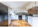 Functional kitchen with white cabinetry and stainless steel appliances at 3483 Napoleon St, Atlanta, GA 30337